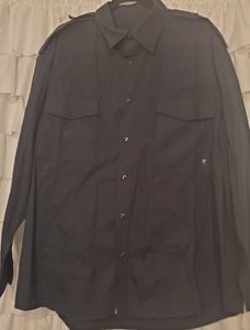 Mens black buttoned down sleeve shirt.